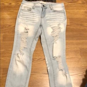 Distressed light wash jeans